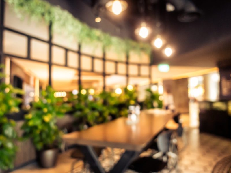 Abstract blur coffee shop cafe interior for background